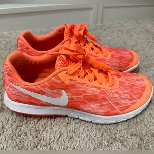 Nike Size 8, bright mango and white tennis shoe